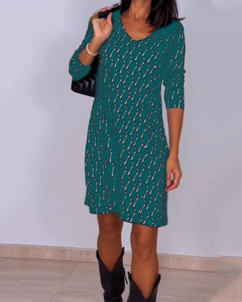 Van Delft Mode® | Jurk met V-hals en ruitjespatroon