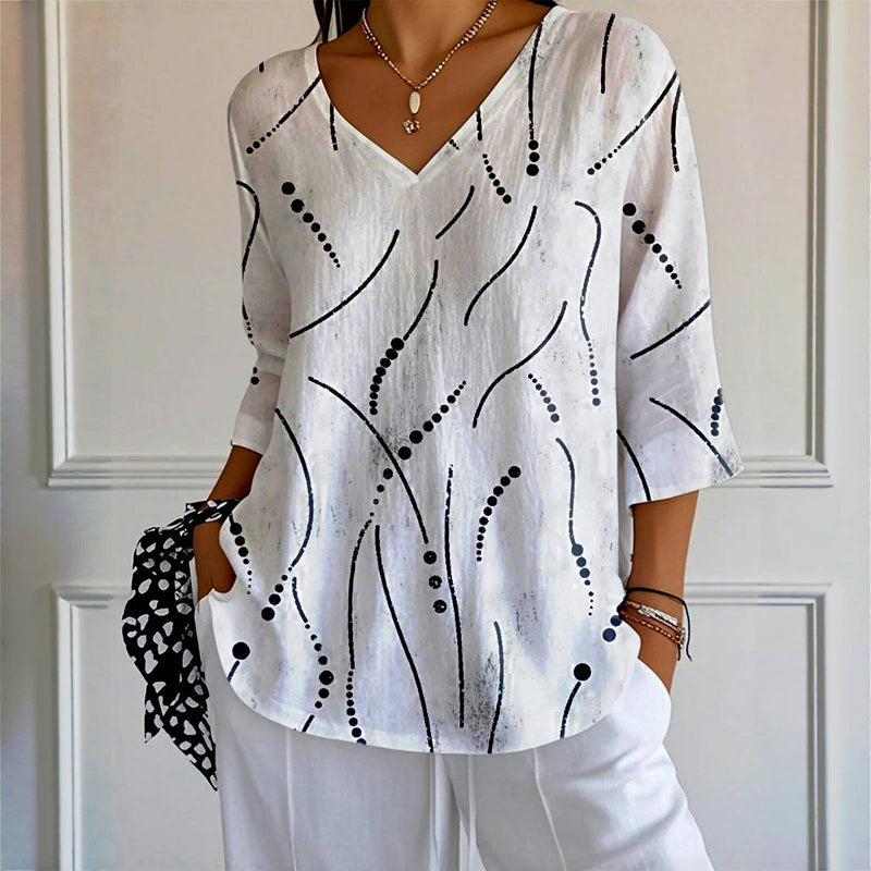 Van Delft Fashion® | Blouse met speelse lijnen en luchtige pasvorm