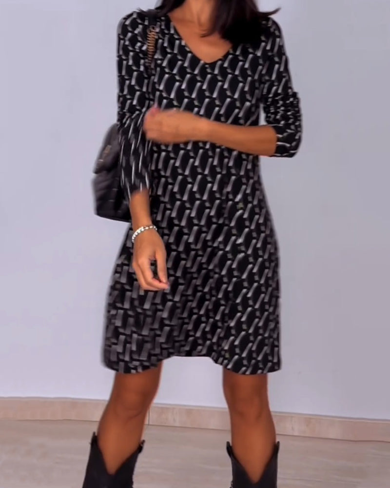 Van Delft Mode® | Jurk met V-hals en ruitjespatroon