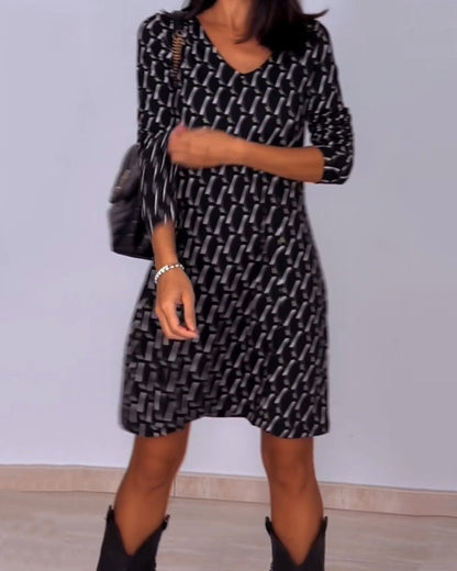 Van Delft Mode® | Jurk met V-hals en ruitjespatroon