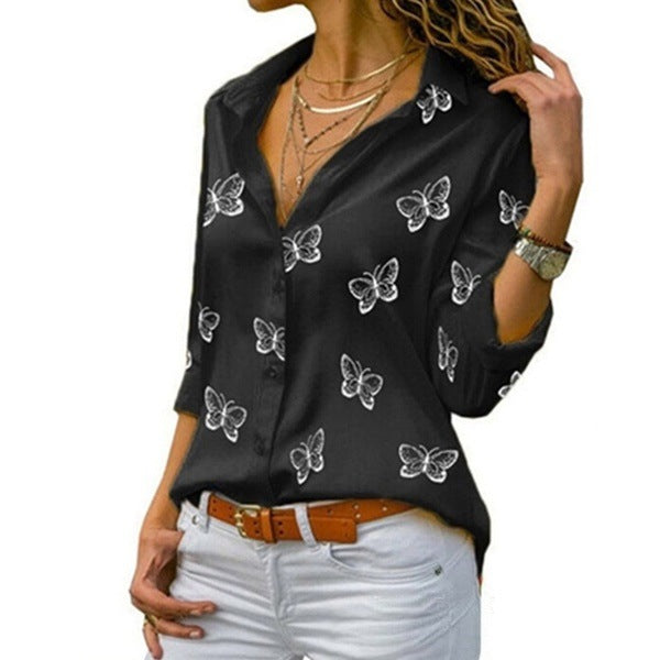 Van Delft Mode® | Losvallende blouse met vlinderprint