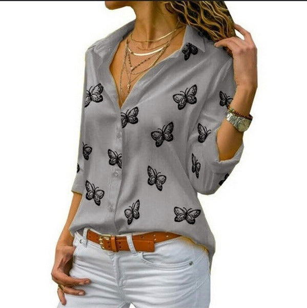 Van Delft Mode® | Losvallende blouse met vlinderprint