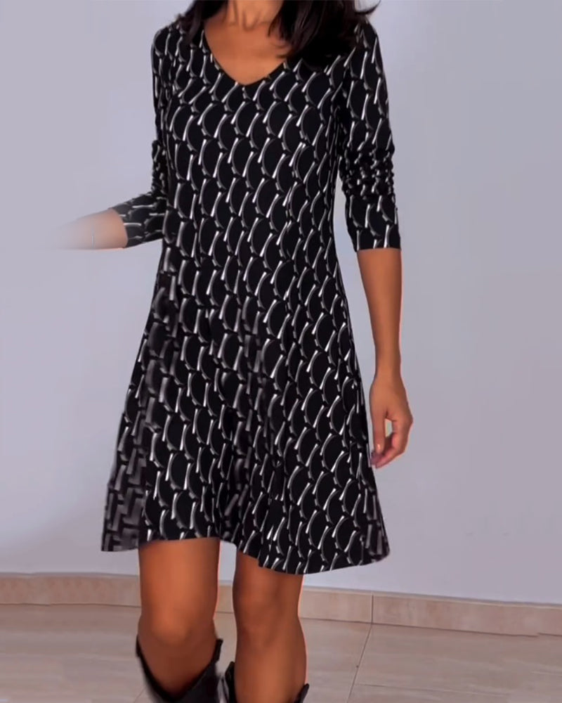 Van Delft Mode® | Jurk met V-hals en ruitjespatroon