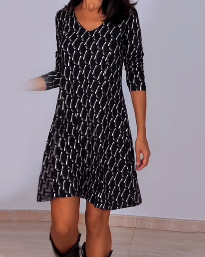 Van Delft Mode® | Jurk met V-hals en ruitjespatroon