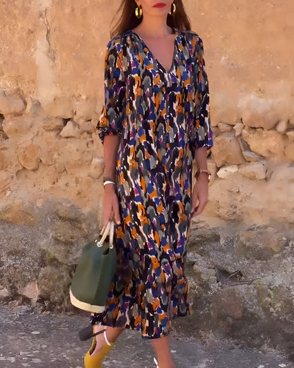 Van Delft Mode® | V-hals jurk met retroprint