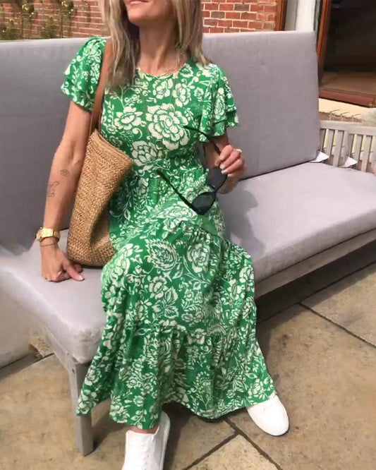 Van Delft Mode® | Lange jurk met korte mouwen en bloemenprint