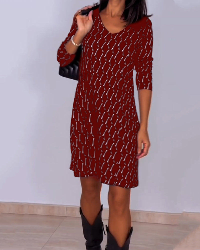 Van Delft Mode® | Jurk met V-hals en ruitjespatroon