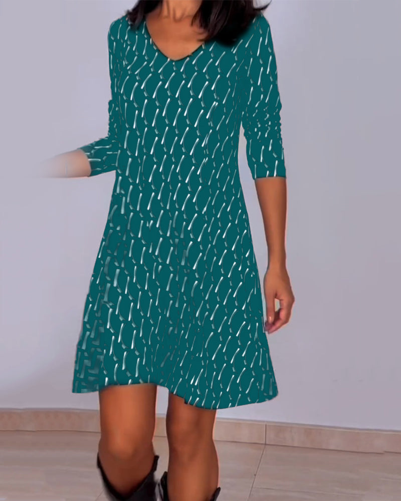 Van Delft Mode® | Jurk met V-hals en ruitjespatroon