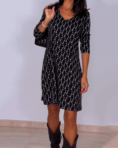 Van Delft Mode® | Jurk met V-hals en ruitjespatroon
