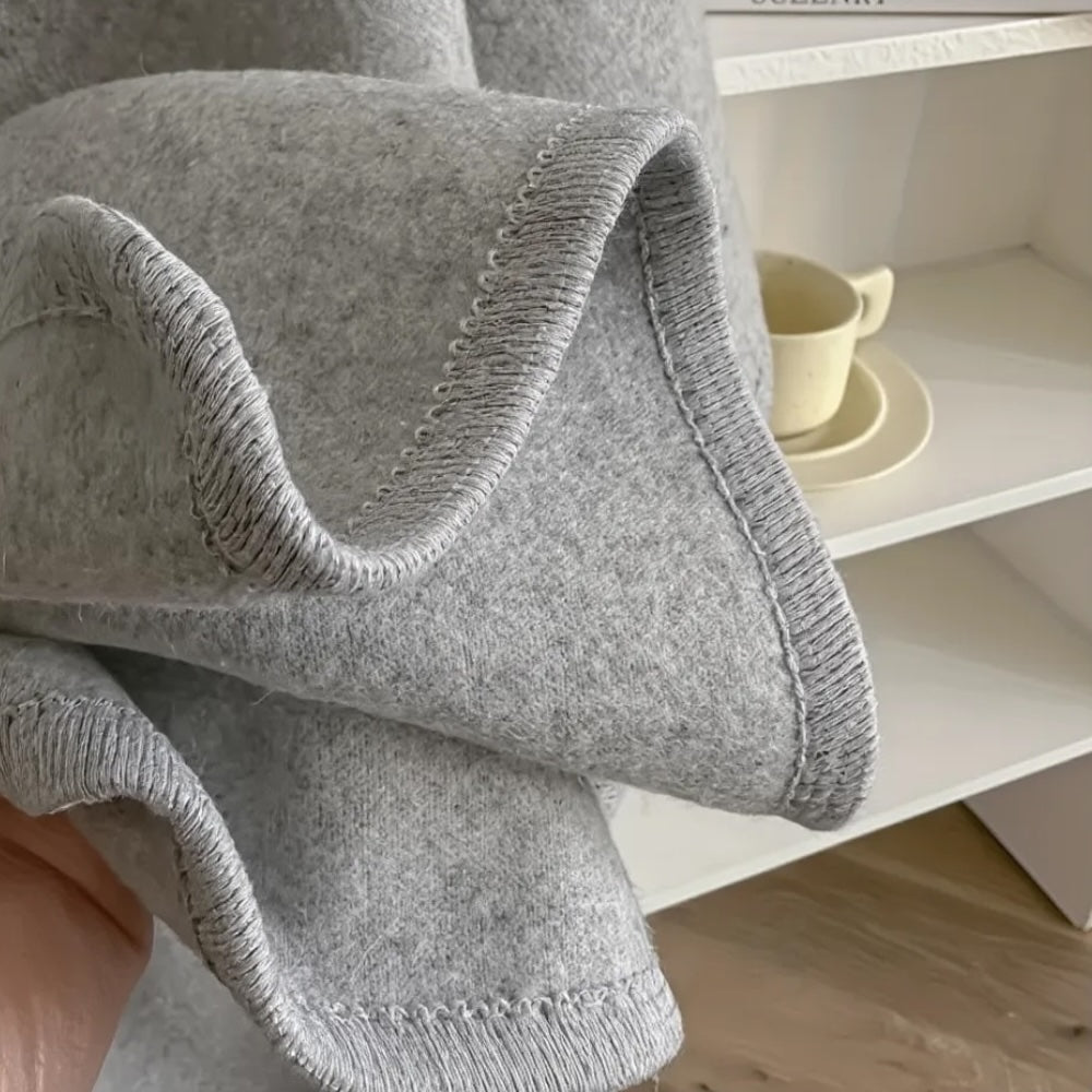 Van Delft Mode® | Comfortabele poncho met franjes