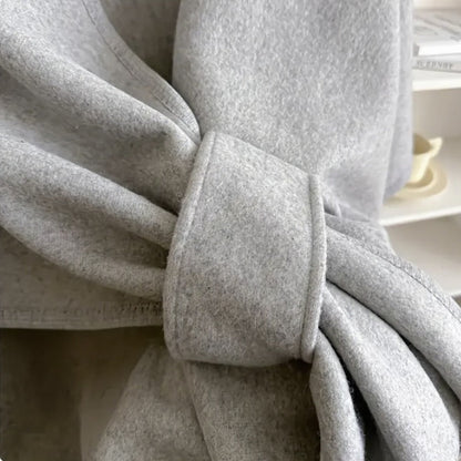Van Delft Mode® | Comfortabele poncho met franjes
