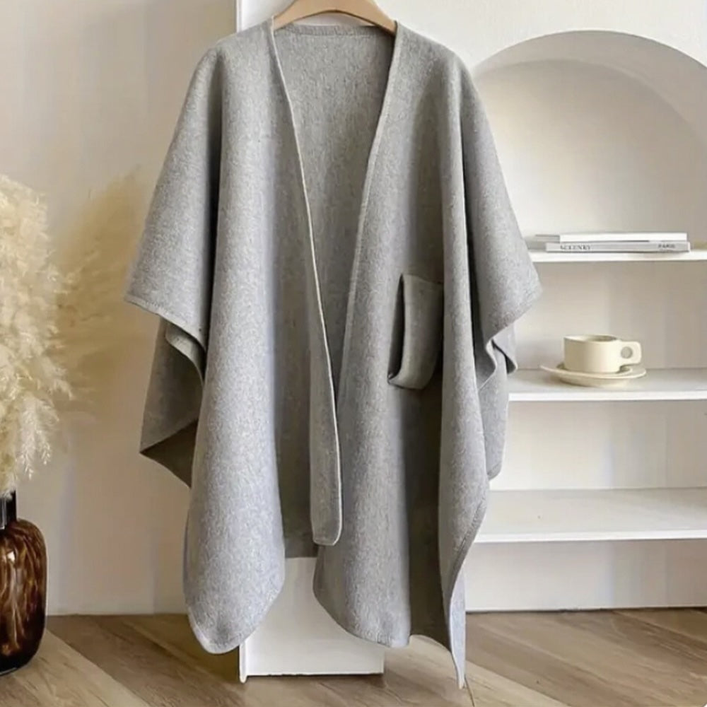 Van Delft Mode® | Comfortabele poncho met franjes