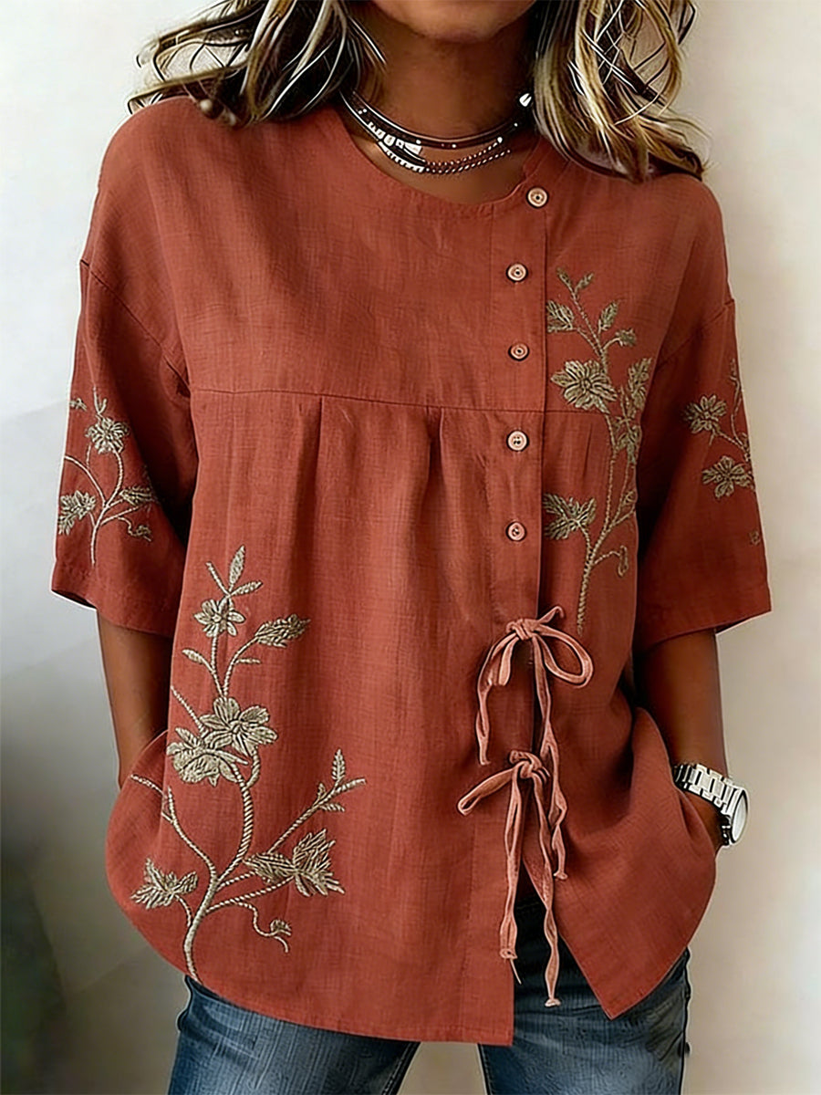 Damesblouse van linnenmix, met knopen, planten- en bloemenmotieven