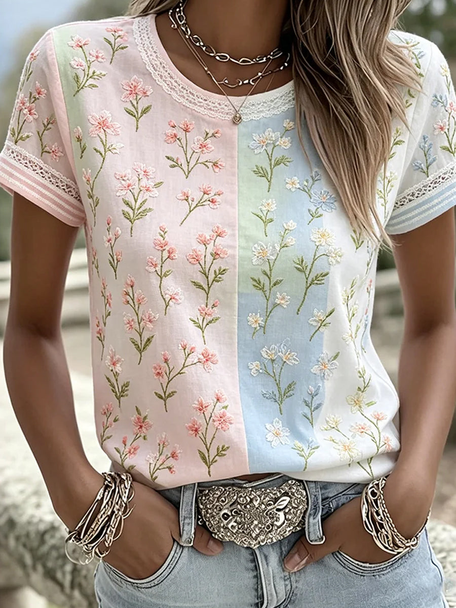 Vrouwelijke vintage casual top met artistieke bloemenprint
